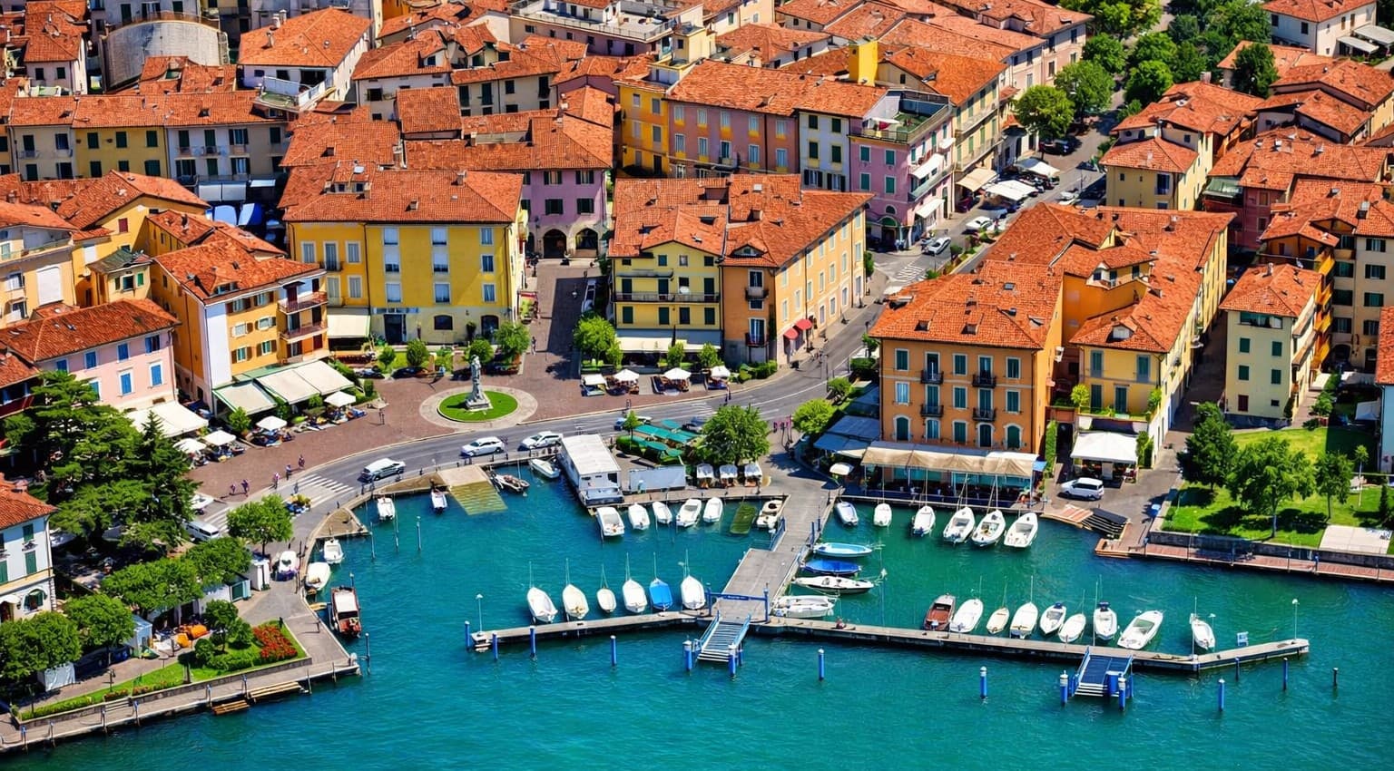 Panoramic view of Iseo town on Lake Iseo with surrounding mountains